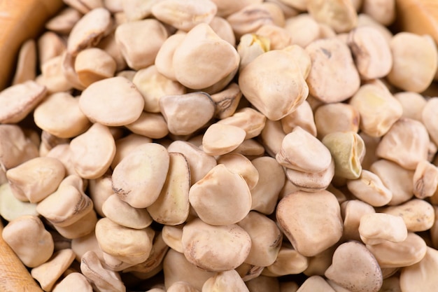 Dry raw cicerchia or indian pea, close up. Legumes known as Lathyrus Sativus, Chickling Vetch, Blue Sweet Pea, made in Puglia, Murgia