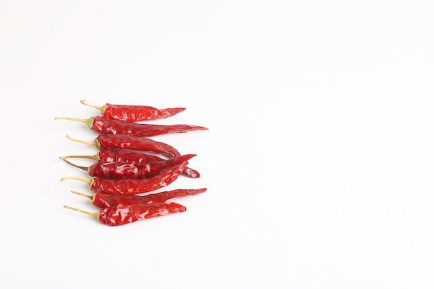 Dry red chilly on white background.