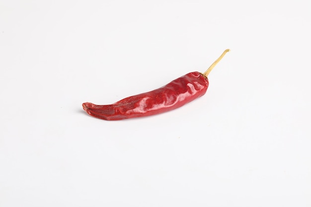 Dry red chilly on white background.