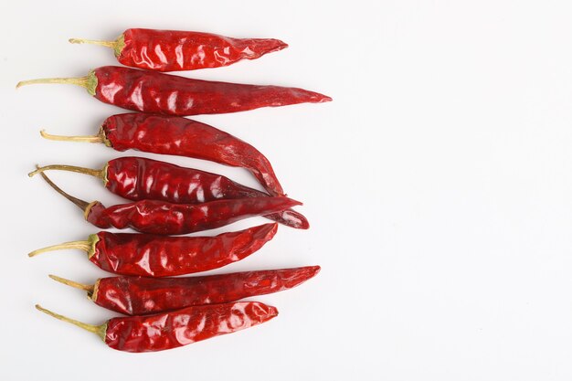 Dry red chilly on white background.