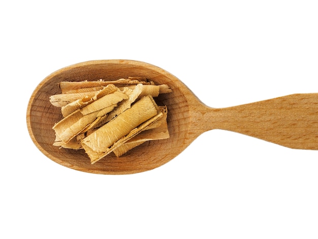 Dry rosehip bark in a wooden spoon