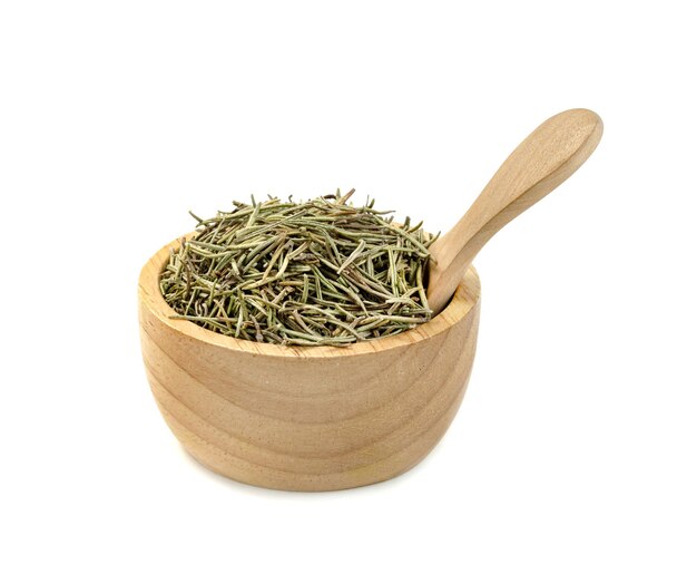 Dry rosemary in wooden bowl and spoon isolated on white background