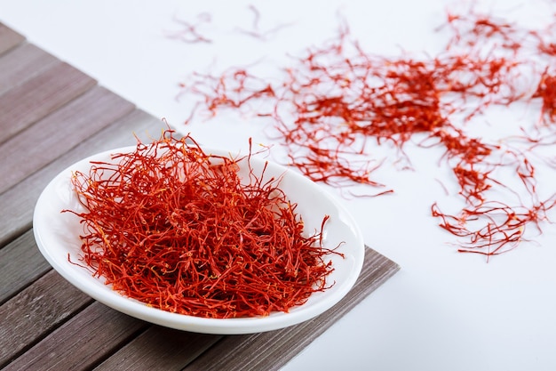 Dry saffron spice on a white plate