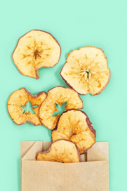 Dry slices of apple, dehydrated fruit chips for plant-based diet