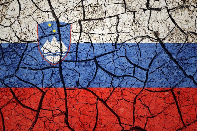 : Dry soil pattern on the flag of Slovenia. Country with drought concept. Water problem.