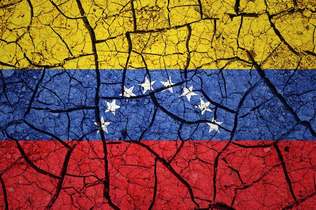 Dry soil pattern on the flag of Venezuela. Country with drought concept. Water problem.