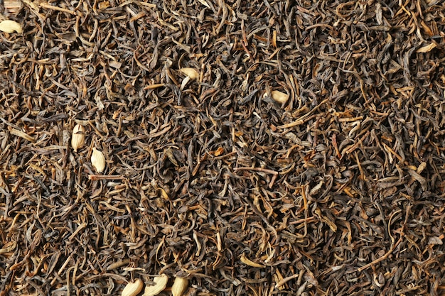 Dry tea leaves background