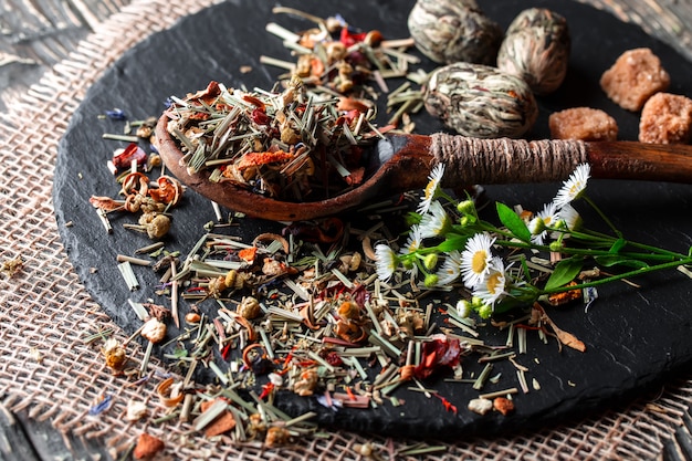 Dry tea leaves on an old table.