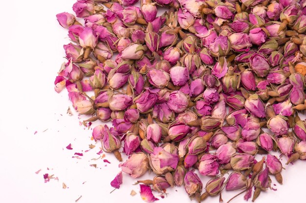 Dry tea roses isolated on a white background