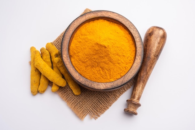 Dry Turmeric Dust or Haldi Powder also known as curcuma longa linn, selective focus