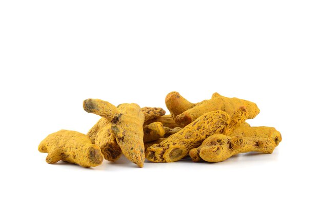 Dry Turmeric roots or barks isolated on white background