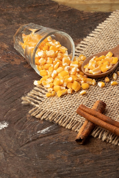 Dry yellow corn with cinnamon sticks