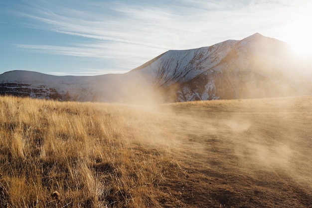 dry yellow grass and fog in the mountains