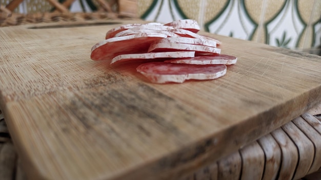 Photo drycured meat product made from pork with aromatic spices and covered with noble mold fuete