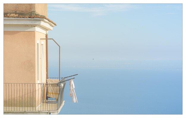 Photo drying clothes against clear sky and sea