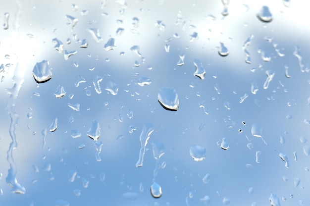 Drying drops on the window left by the rain.close up.