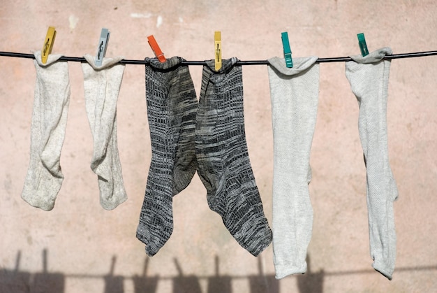 Drying socks with shadows on the wall