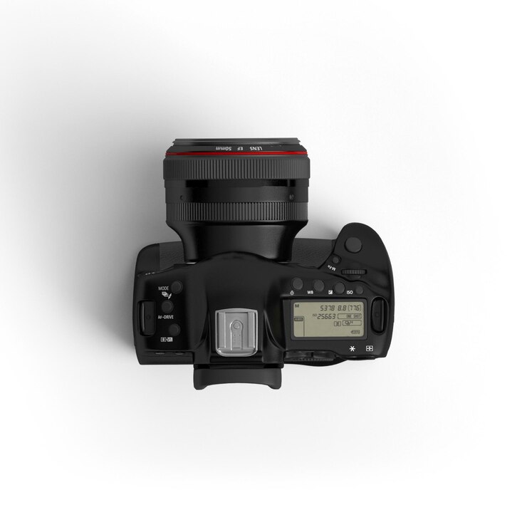 Foto dslr-camera met zwart lichaam aan de voorzijde en beeld van bovenaf op witte achtergrond