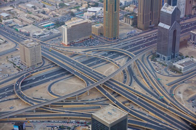 dubai city skyline   main road and new skyscrapers at sunset