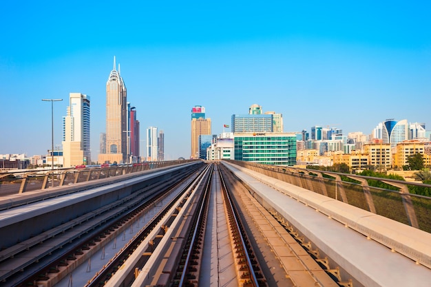 Dubai metro and city skyline uae