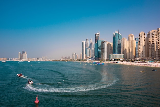 Dubai skyline scyscraper modern district seen from water