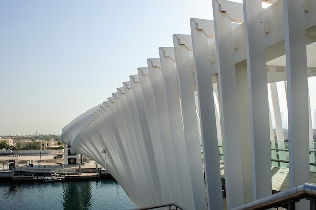 Dubai, UAE - APRIL 24, 2020: view of the modern twisted bridge crossing the Dubai creek