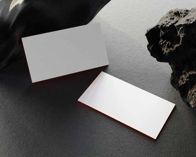 Dubbelzijdig visitekaartje mockup Wit vel papier of blanco visitekaartje sjabloonontwerp in de buurt van rotsen