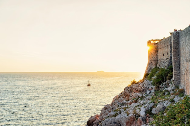 Dubrovnik Fortress and a ship at the Adriatic Sea, Croatia