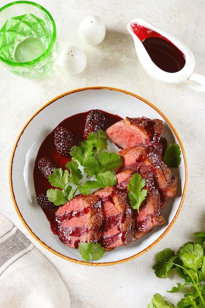 Duck breast in blackberry sauce