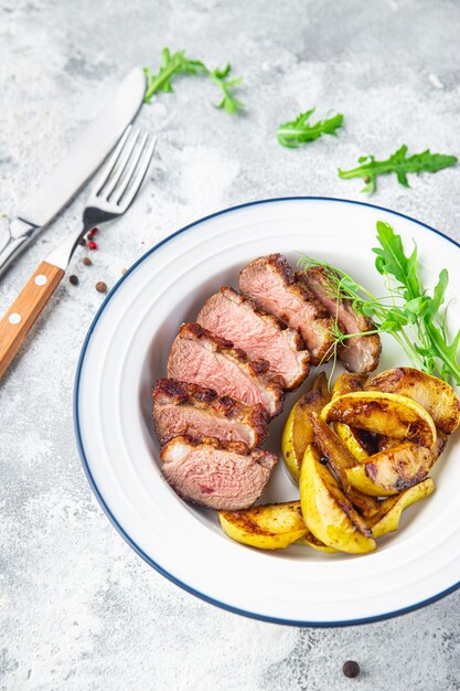 duck breast meat and garnish poultry second course fresh meal snack on the table copy space food