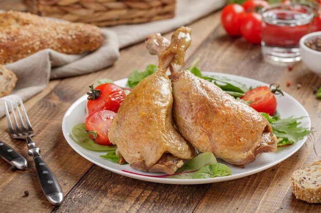 duck chicken baked legs with vegetables
