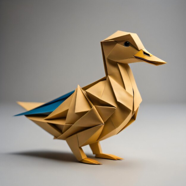 A duck made of paper with a blue and orange body.