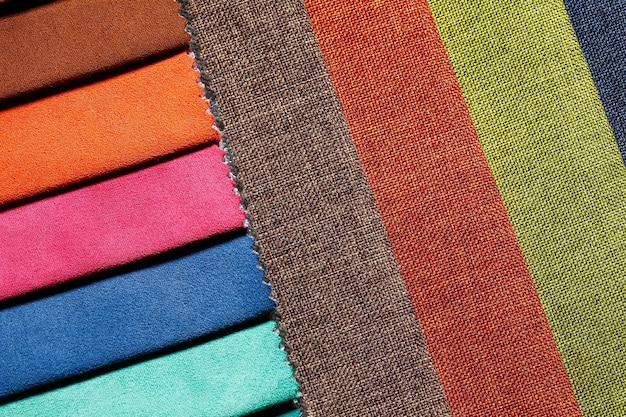Duidelijke textielachtergrond in uw bewonderenswaardige kleuren