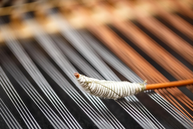 Dulcimer string and wooden bat