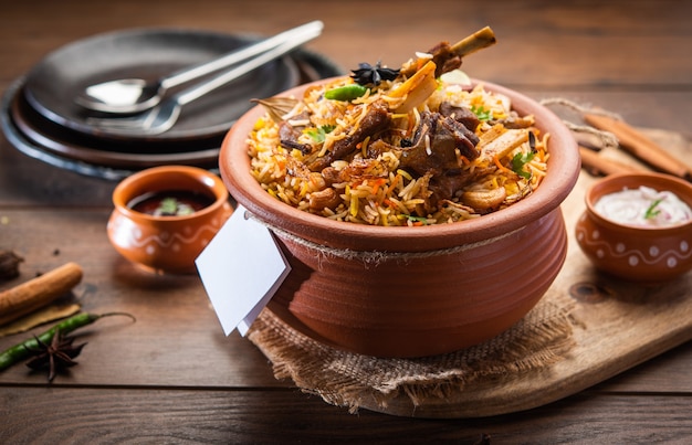 Dum Handi MuttonÃÂÃÂ BiryaniÃÂÃÂ or gosht pilaf is prepared in an earthen or clay pot called Haandi or 1 kilo size. Popular Indian non vegetarian foodÃÂÃÂ 