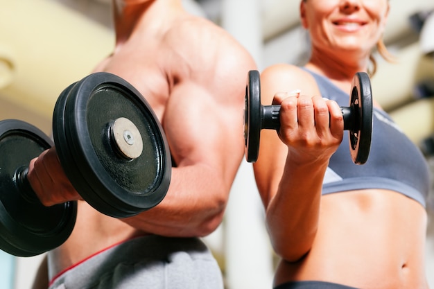 Dumbbell exercise in gym 