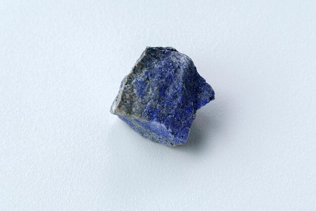 Dumortierite a close up of blue mineral macro an outdoor shot geology white background