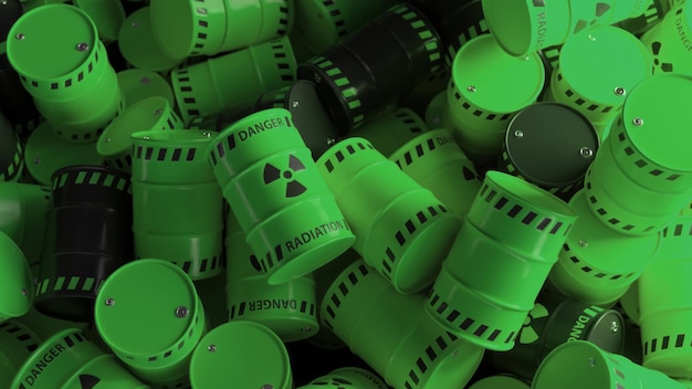 Dump of green and black barrels with nuclear radioactive waste danger of radiation contamination of