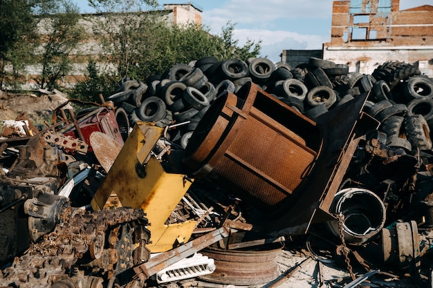 Dump of old rusty metal and tires