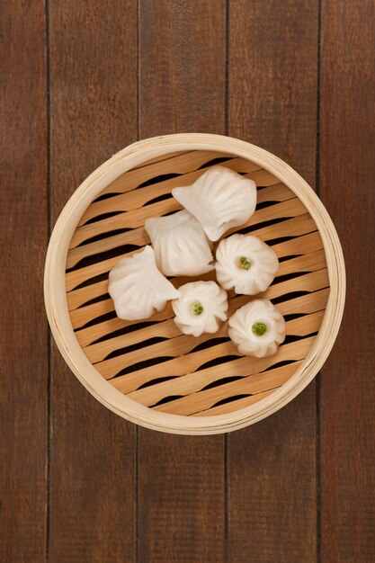 Dumplings in bamboo steamer