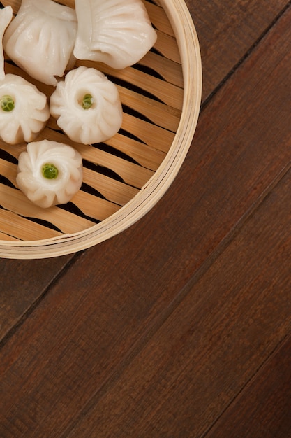 Dumplings in bamboo steamer