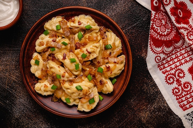 Dumplings filled with mashed potatoes Russian Ukrainian or Polish dish varenyky vareniki pierogi pyrohy