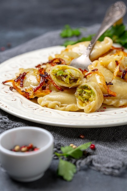Photo dumplings stuffed with stewed cabbage and onions