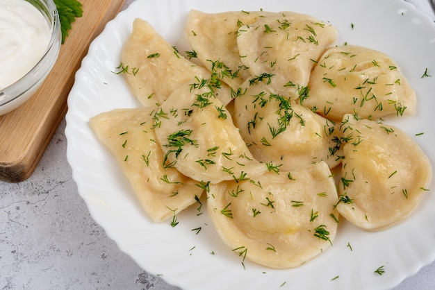 Foto gnocchi con patate con aneto verde varenyky vareniki pierogi pyrohy