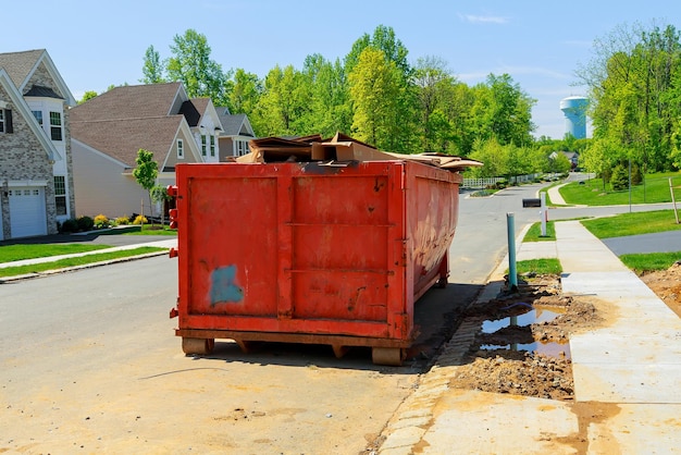 Dumpsters being full with garbage container over flowing