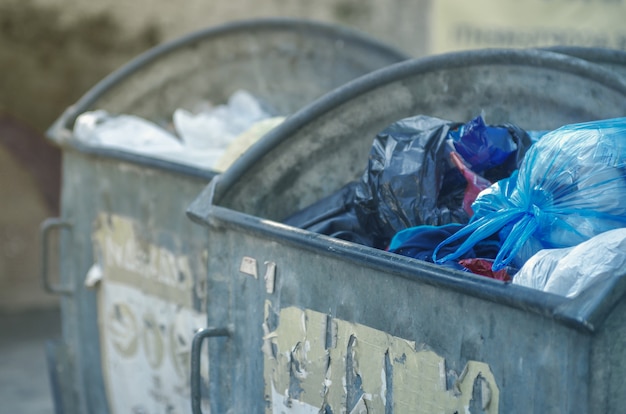 Dumpsters being full with garbage