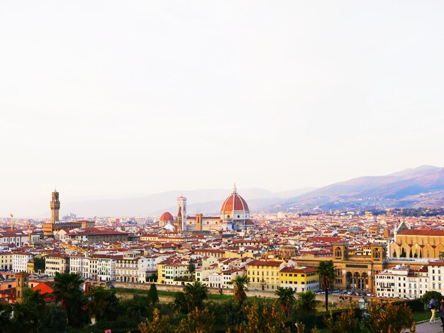 Photo duomo santa maria del fiore amidst cityscape