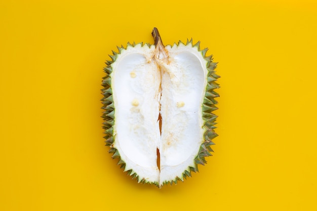 Durian peel on yellow surface