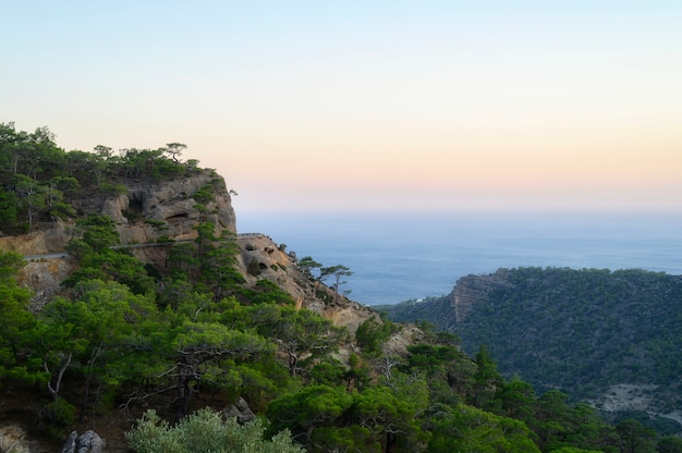 Dusk mountain landscape with views of the Mediterranean sea