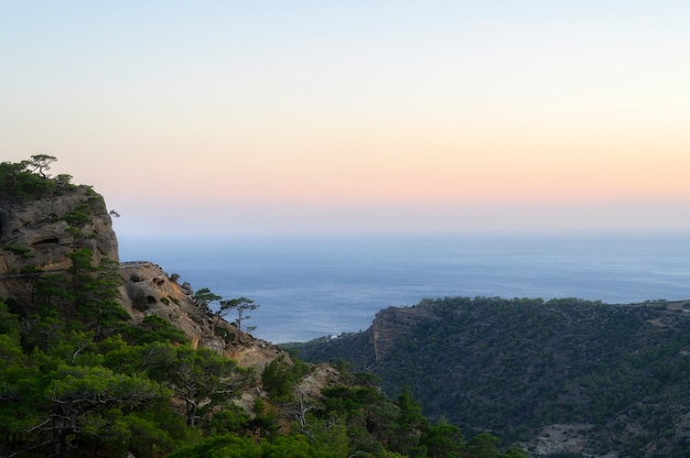 Dusk mountain landscape with views of the Mediterranean sea